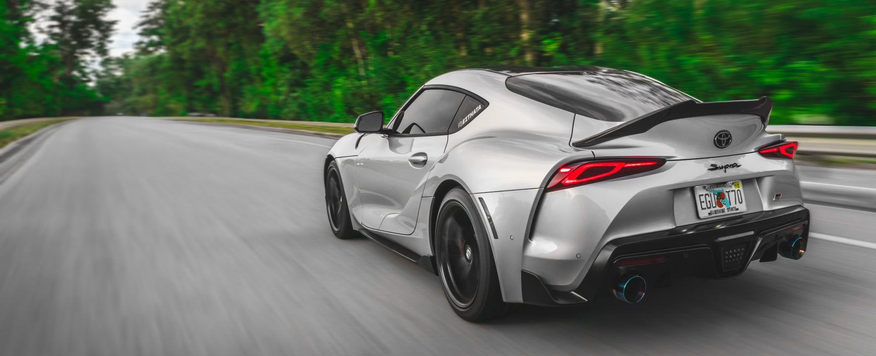 Supra driving down road